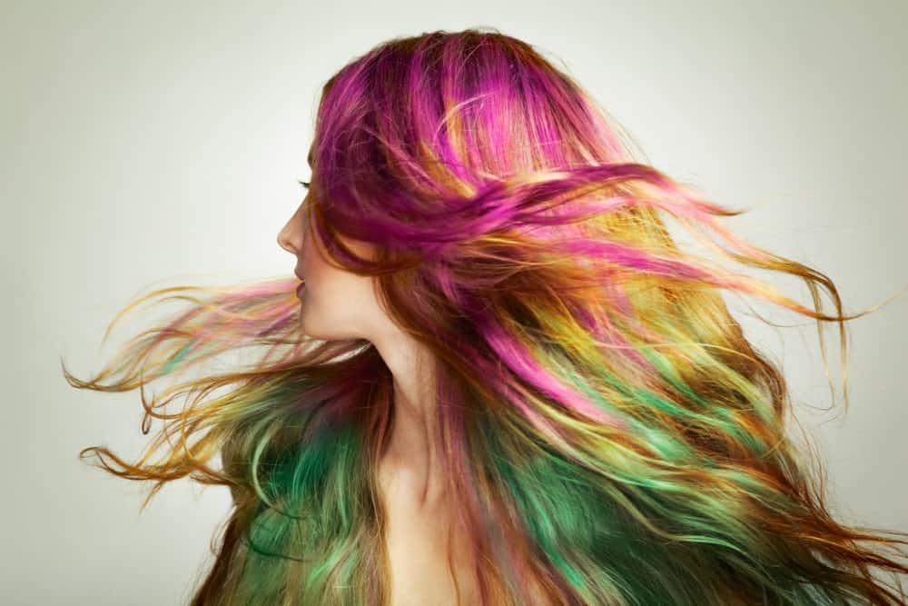 A young, beautiful girl with colored hair