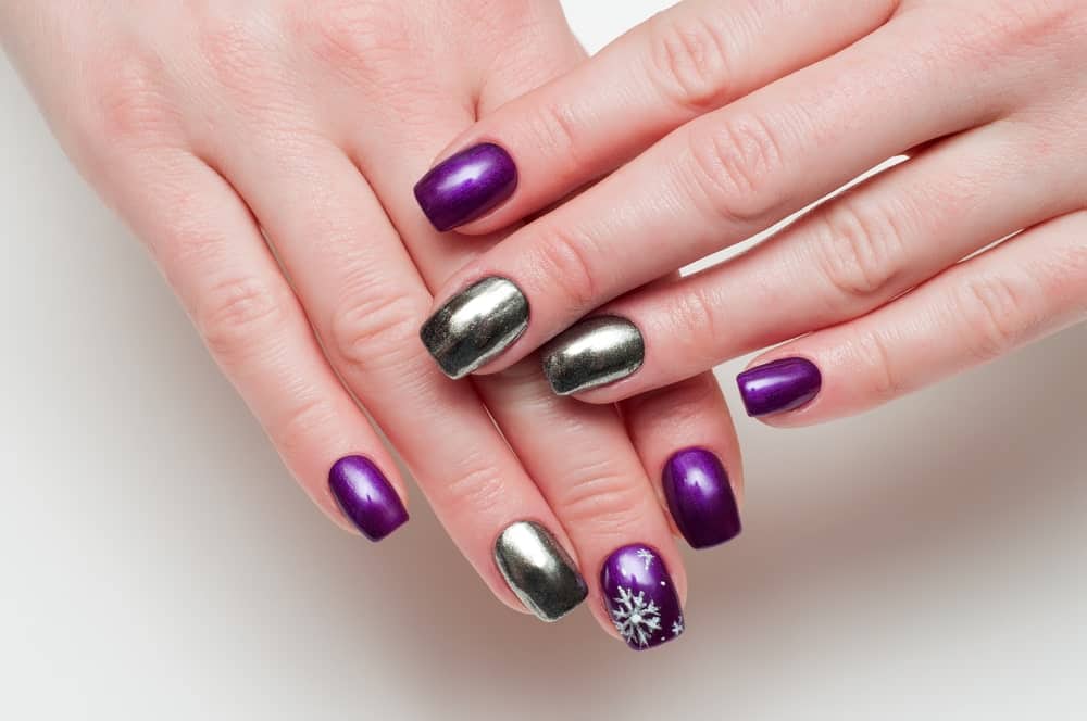 Mirror manicure on a woman’s hands 