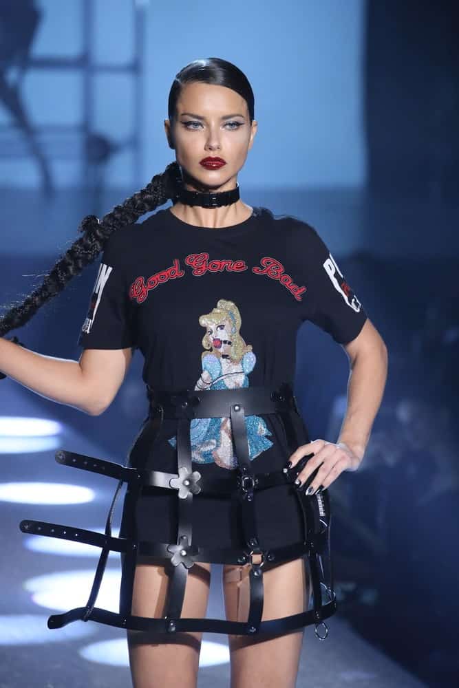 Adriana Lima walked the runway at the Philipp Plein fashion show at Hammerstein Ballroom on September 9, 2017 in New York City. Her hair was styled with a super slick ponytail with a long braid.