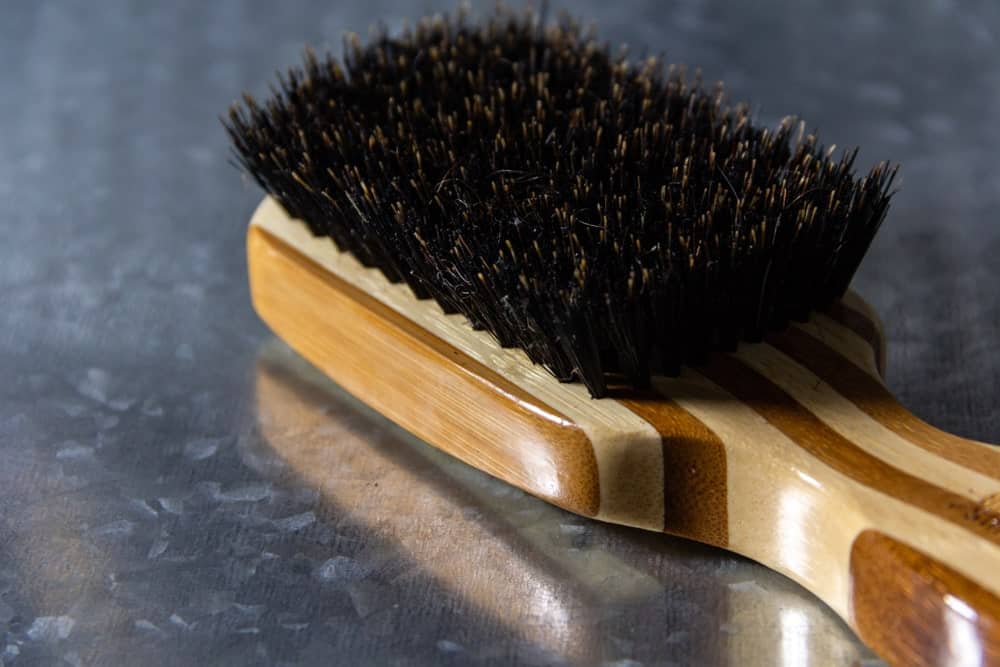 Hair brush with boar hair bristles.
