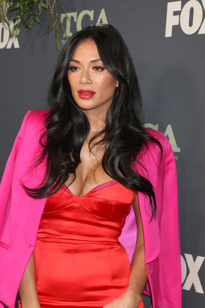 Nicole Scherzinger slayed the red carpet at the FOX TCA All-Star Party at the Fig House on February 1, 2019, with her voluminous black hair and a gorgeous red dress.