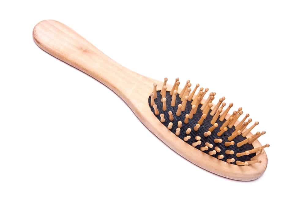 Hair brush with wooden bristles.