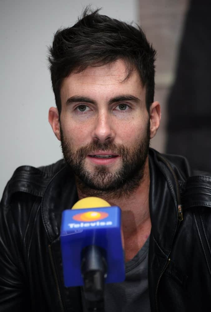 Lead vocalist of Maroon 5 Adam Levine attended the press conference before a performance at the Palacio de los Deportes in Mexico City on November 4, 2008. He was handsome with his full beard and tousled undercut hairstyle.