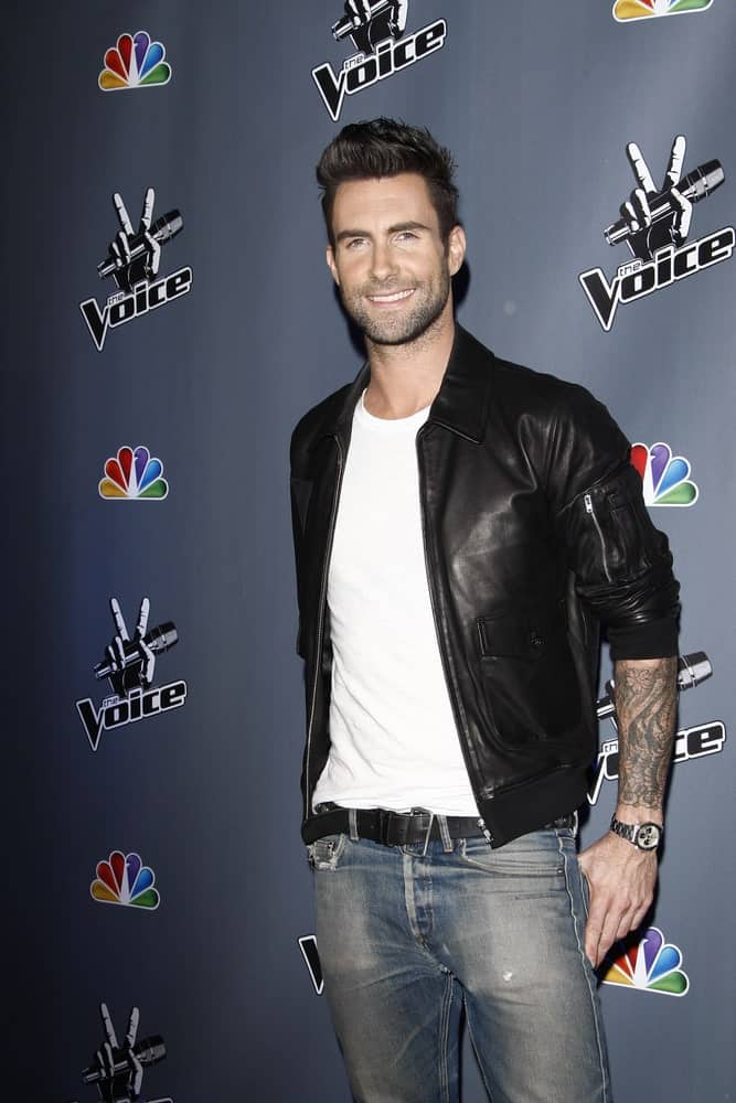 Adam Levine attended "The Voice" Press Junket on October 28, 2011 at the Sony Pictures Studios in Culver City, Los Angeles, California. He came in an edgy and sexy black leather jacket to pair with his spiked undercut hairstyle.