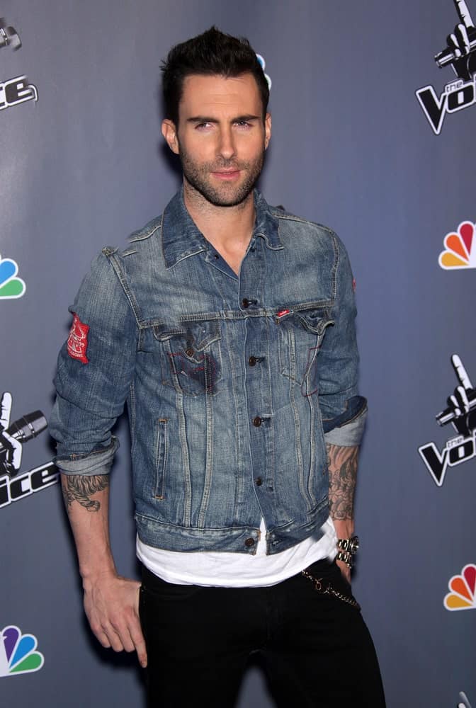 Adam Levine’s spiked crew cut hairstyle is a nice complement to his edgy denim jacket when he attended the Press Junket for “The Voice” on March 15,2011 in Los Angeles, CA.