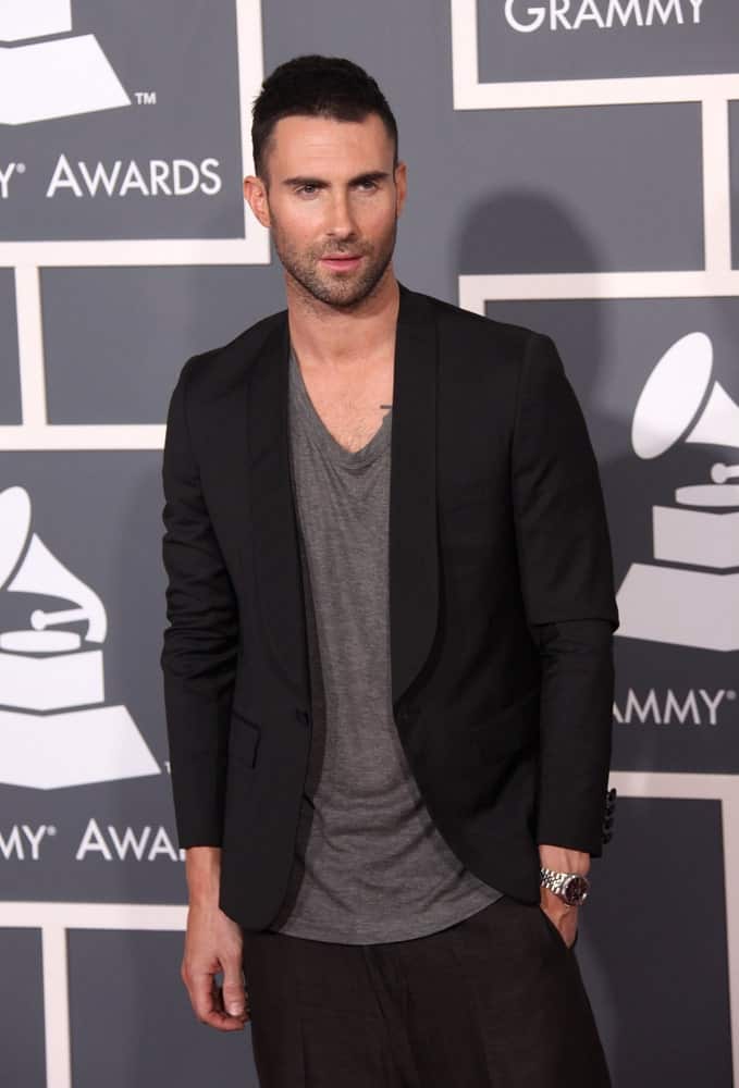 Adam Levine was quite stylish in his baggy outfit and his Caesar fade hairstyle when he arrived at the 2011 Grammy Awards on February 13, 2011 in Los Angeles, CA.