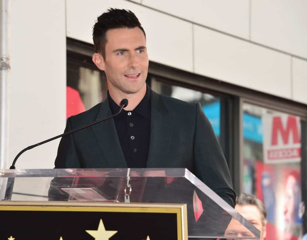 On February 10, 2017, singer Adam Levine was honored at the Hollywood Walk of Fame with his own Star Ceremony. He wore smart casual charcoal jacket with his iconic spiky fade hairstyle.