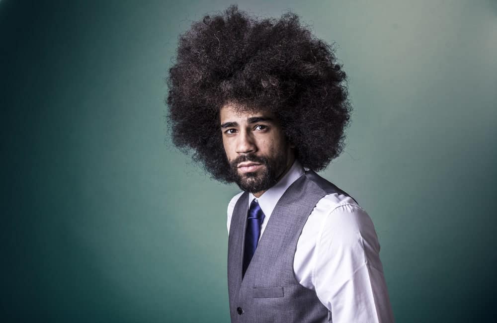 Afro, often referred to as 'fro, is a hairstyle that can be used by both men and women, although it is a much popular choice for men. Afro hairstyle can be done to short or even long hair. 