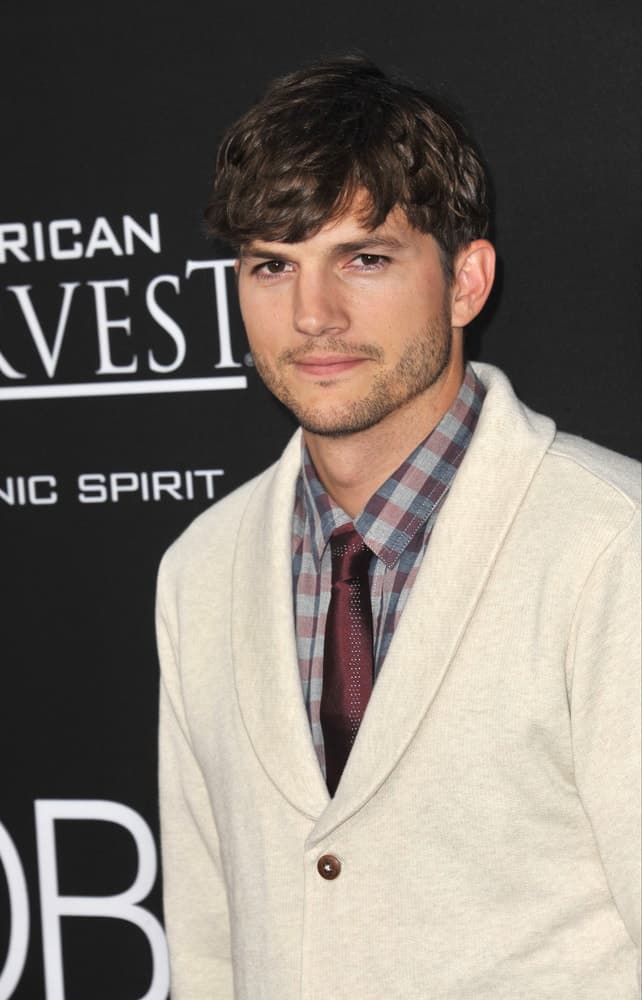 Ashton Kutcher at the Los Angeles premiere of his movie "Jobs" at the Regal Cinemas LA Live in 2013.