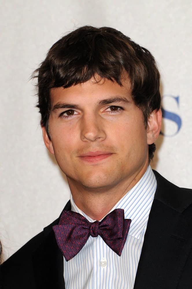 Ashton Kutcher paired his bow tie outfit with a long Caesar hairstyle that has subtle highlights at the 2010 People's Choice Awards Press Room, Nokia Theater in Los Angeles.