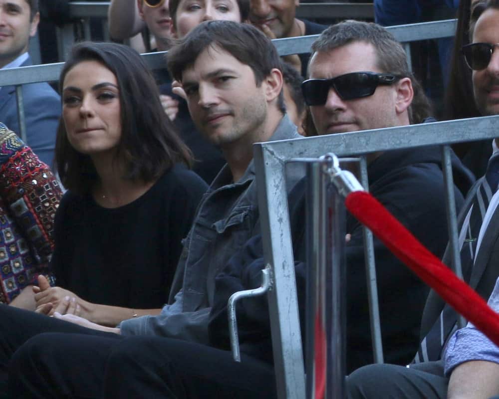 Mila Kunis, Ashton Kutcher and Sam Worthington were at the Zoe Saldana Star Ceremony on the Hollywood Walk of Fame on May 3, 2018 in Los Angeles. Kutcher  wore a casual denim jacket to go with his short side-parted hairstyle.