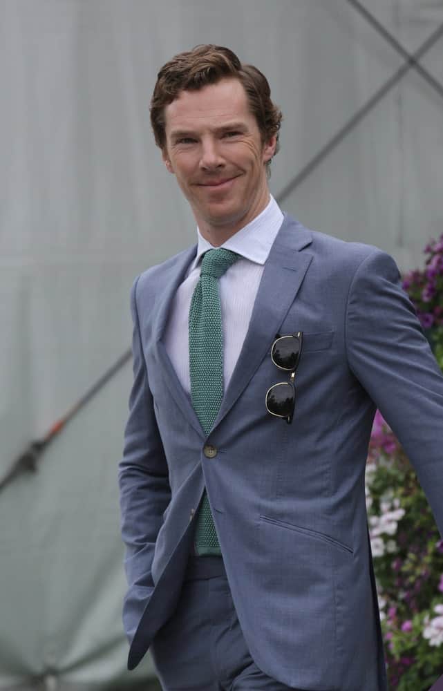 Benedict Cumberbatch's natural wavy locks styled in a deep side part during the Wimbledon Championships in London on Jul 12, 2015. 