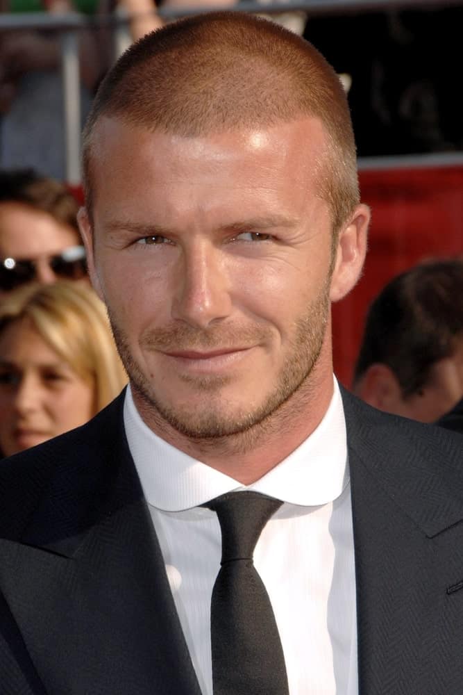 The buzz cut is often referred to as the younger brother of the bald style. Here's David Beckham in a buzz cut, photo taken at the Nokia Theatre L.A. Live during the 2008 ESPY Awards.