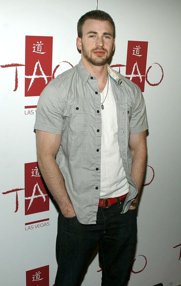 Chris Evans's muscular arms were on full display with his casual outfit paired with a short crew cut hairstyle and trimmed beard at TAO Partner Jason Strauss' Birthday Party in Las Vegas on April 12, 2008.