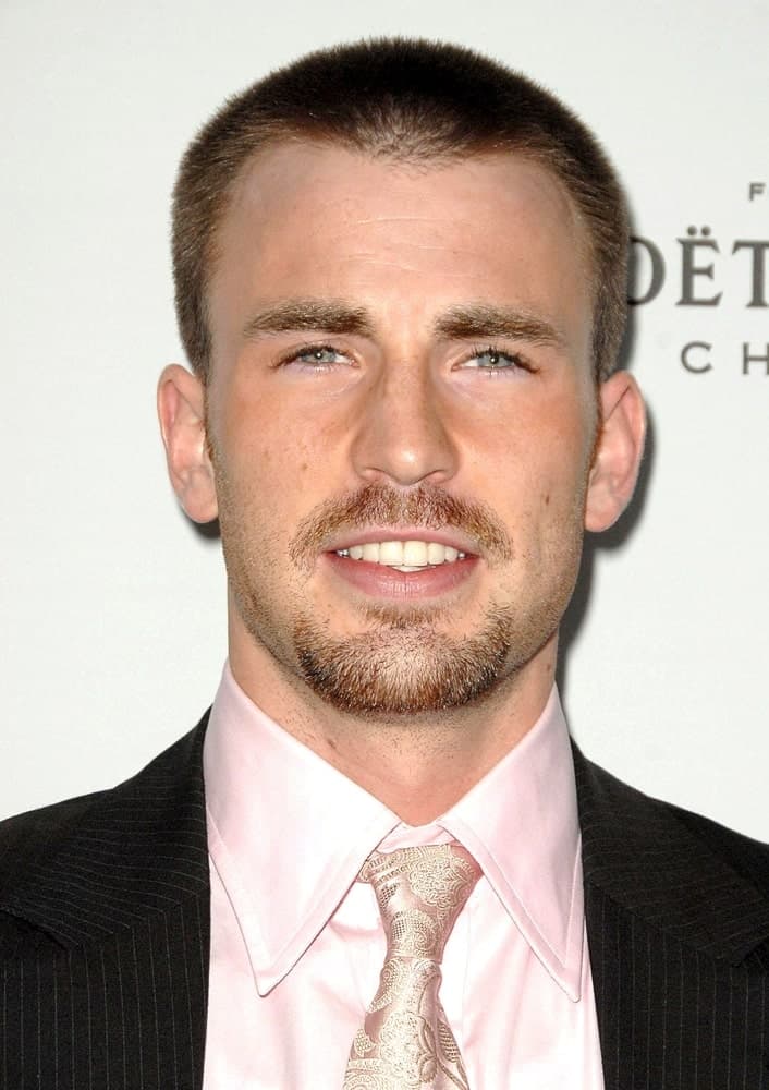 Chris Evans sported a goatee with his buzz cut hairstyle and pick tie at the 15TH Annual ELLE Women in Hollywood Event held at The Four Seasons Beverly Hills in Los Angeles on October 06, 2008.