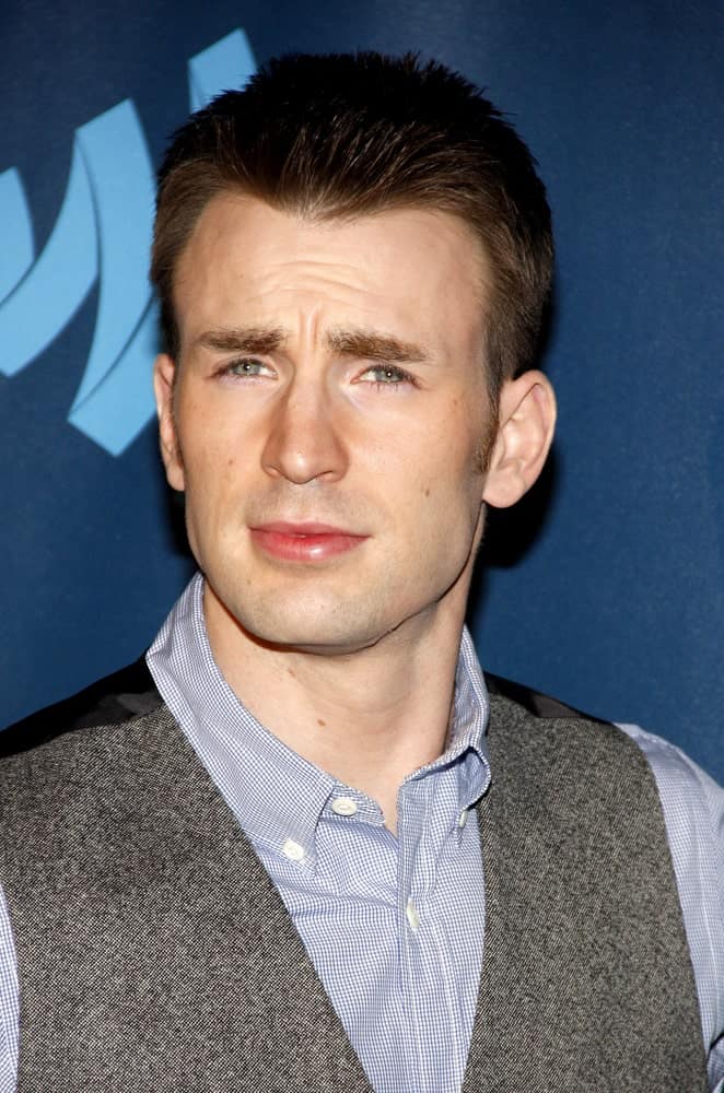 A clean-shaven Chris Evans was at the 24th Annual GLAAD Media Awards at the JW Marriott Los Angeles at L.A. LIVE on April 20, 2013. He wore a smart casual outfit with his spiked crew cut hairstyle.
