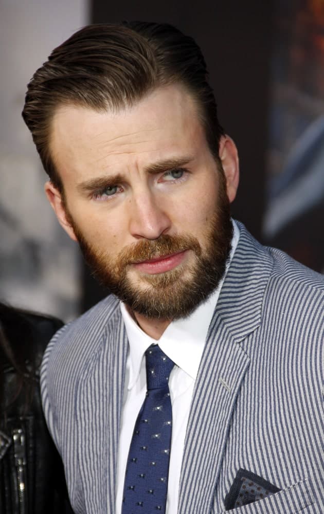 Chris Evans’ beautiful full trimmed beard goes perfectly well with his slicked back side-parted hairstyle at the World premiere of Marvel’s ‘Avengers: Age Of Ultron’ held at the Dolby Theatre in Hollywood on April 13, 2015.