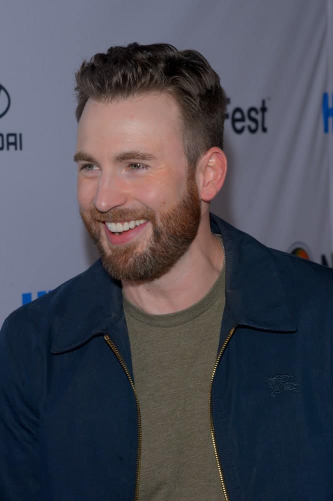 Chris Evans flashed his bright smile with his casual outfit and side-parted fade hairstyle at the opening night screening of “Sell By” during NewFest Film Festival at SVA Theater on October 23, 2019 in New York City.