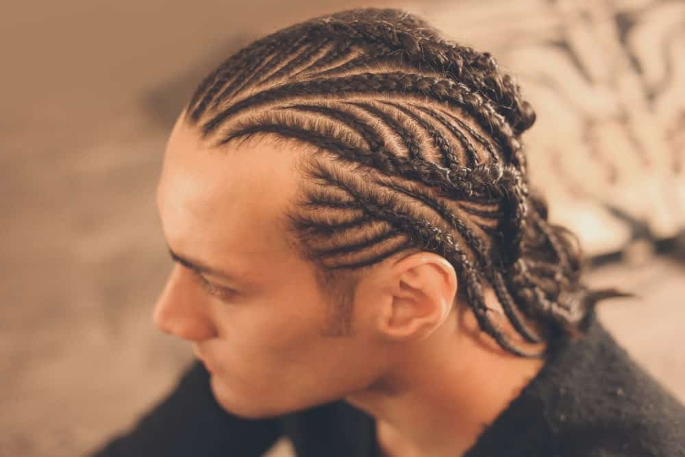 Cornrows are very popular among young men. It originates from the African culture and became very popular after NBA legend Allen Iverson wore the hairstyle on the court.