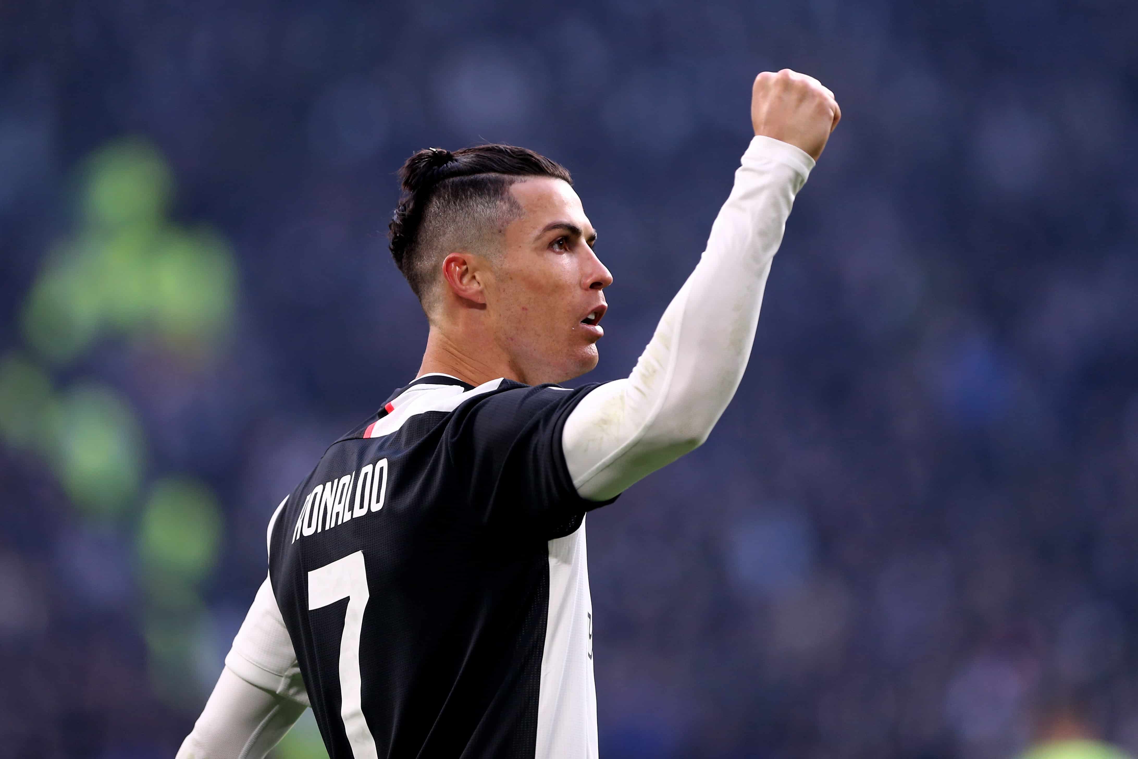 Captain of the Portugal National Team and Juventus' forward striker, Cristiano Ronaldo in a man bun during a match against Cagliari Calcio.