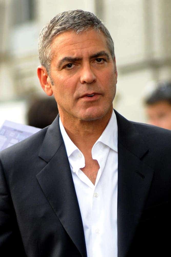 On January 22, 2018, actor George Clooney was seen in Milan, Italy. He wore a smart casual suit with his short and gray Caesar cut hairstyle.