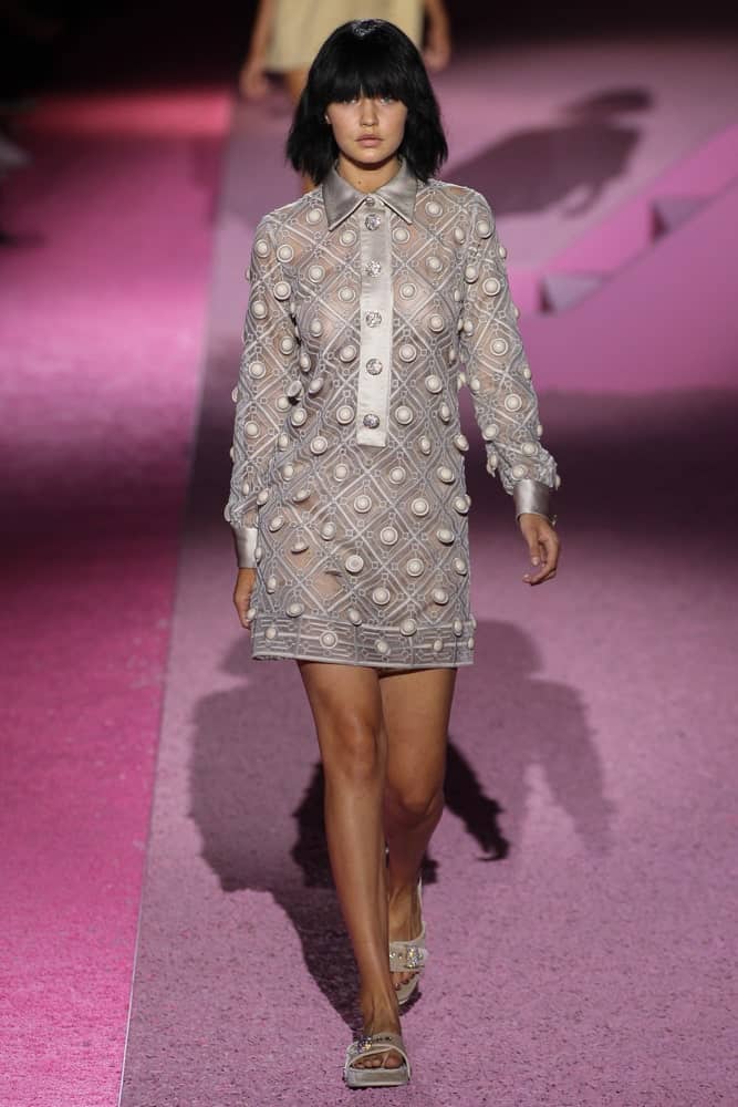 Model Gigi Hadid walked the runway at Marc Jacobs during Mercedes-Benz Fashion Week Spring 2015 at Seventh Regiment Armory on September 11, 2014. Her hair was styled into a raven short bob hairstyle with blunt bangs.