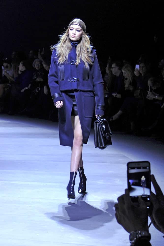 Supermodel Gigi Hadid walked the runway with a long and wavy tousled hairstyle on June 2016 at the Milan Woman Fashion Week for Versace in Italy.