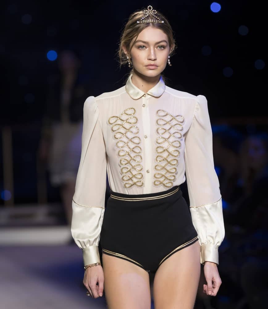 Gigi Hadid walked the runway during the Tommy Hilfiger Women's show on February 15, 2016 at Park Avenue Armory in New York City. She looked gorgeous with her messy ponytail hairstyle fitted with a tiara headband.