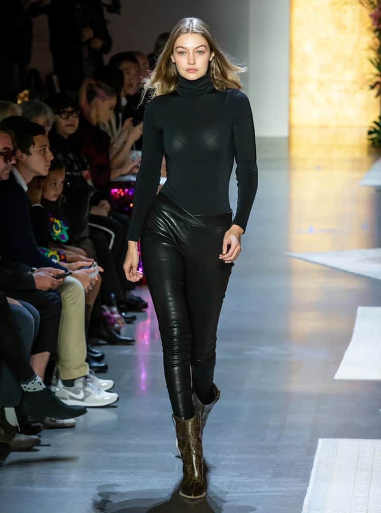 Gigi Hadid's sexy black outfit was a perfect fit for her curves and loose tousled hairstyle at the runway during rehearsal for the Anna Sui Spring Summer 2019 fashion show on September 10, 2018.