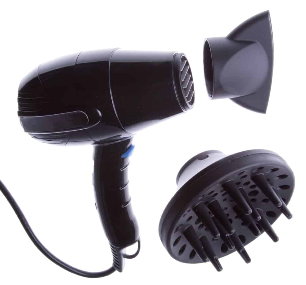 Heat Gun Vs Hair Dryer. A hair dryer and its interchangeable nozzles.
