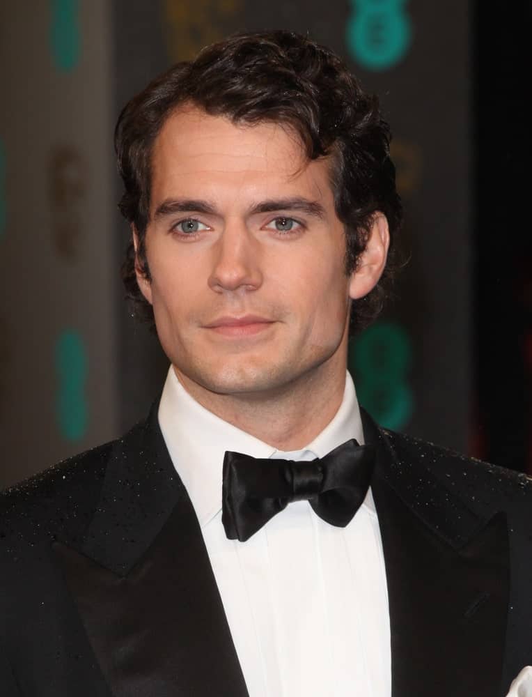 Henry Cavill exhibited his curly black hair with side-parting during the 2013 British Academy Film Awards, at the Royal Opera House, London last October 2nd.