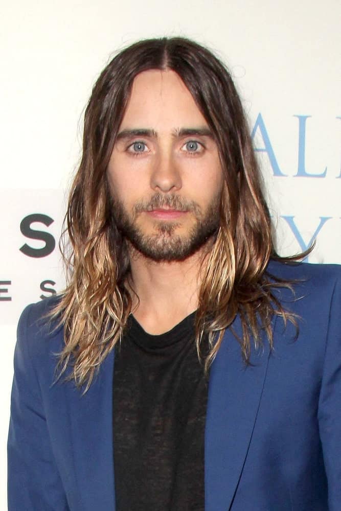 Jared Leto styled his long parted locks with highlights and messy textured ends at the "Dallas Buyers Club" - Los Angeles Premiere last October 17, 2013.