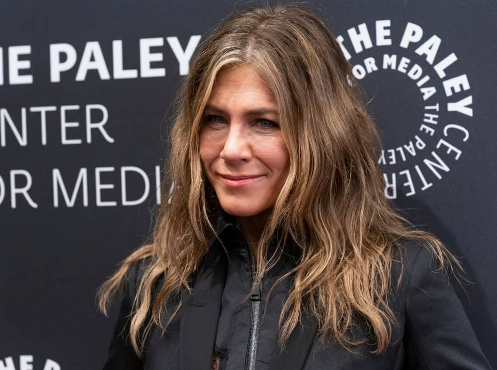 Jennifer Aniston paired her black dress by Madison Margiela with a tousled wavy hairstyle at the PaleyLive NY: Apple TV The Morning Show Preview Screening last October 29, 2019.