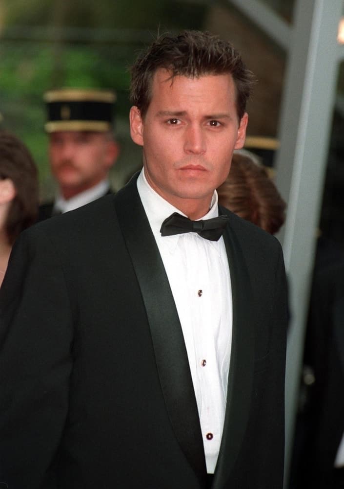 Last May 11, 1997, Johnny Depp was at the 1997 Cannes Film Festival. wearing a classy suit to match his clean-shaved fresh face and spiky crew cut hair.