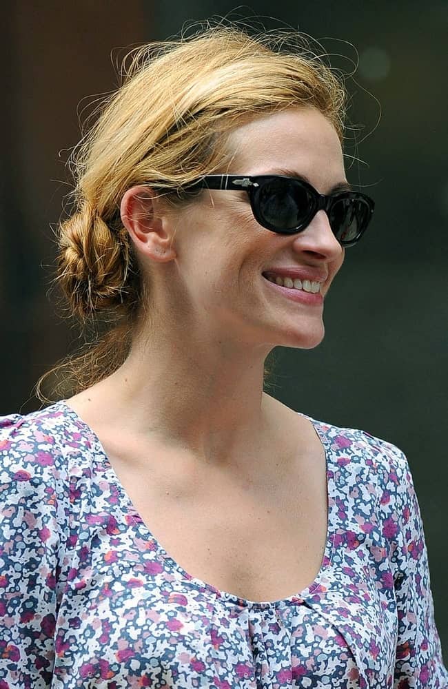 The actress on location for EAT LOVE PRAY filming in Lower Manhattan, New York on August 20, 2009. She wore a tousled low twisted bun paired with black shades.