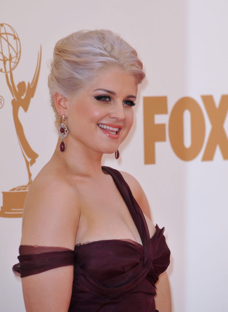 Kelly Osbourne at the 2011 Primetime Emmy Awards at the Nokia Theatre in downtown Los Angeles, September 18, rocking a silver hairstyle and a purple one-shoulder dress.