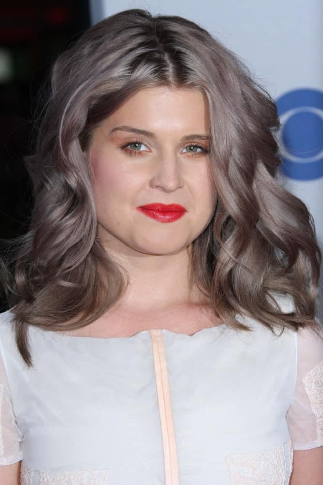 A fabulous-looking Kelly Osbourne with her gorgeous hairstyle and color, perfectly paired with her white dress. Photo taken on January 11, 2012.