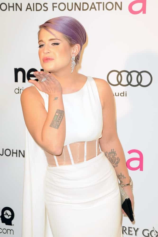 The lovely Kelly Osbourne blowing kisses to the media and fans at the 21st Academy Awards Viewing Party on 24th of February 2013 held at the West Hollywood Park in Hollywood, California.