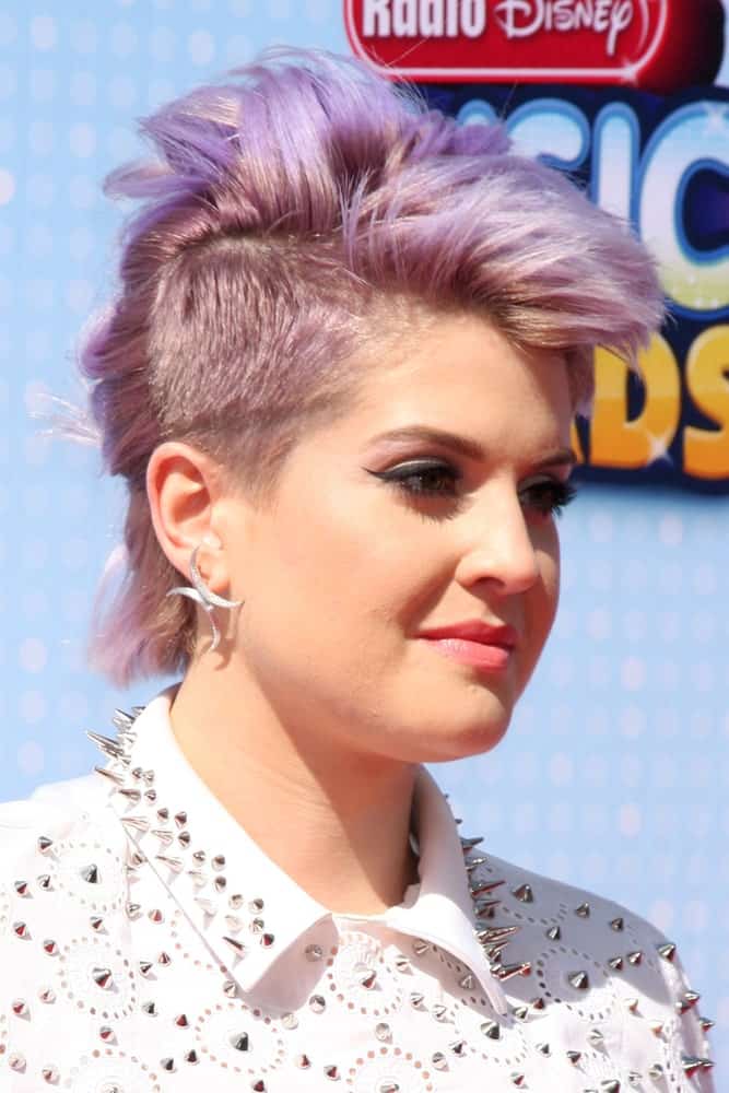 A bold and fierce Kelly Osbourne, still with her iconic purple hair at the April 16, 2014 Radio Disney Music Awards at Nokia Theater.