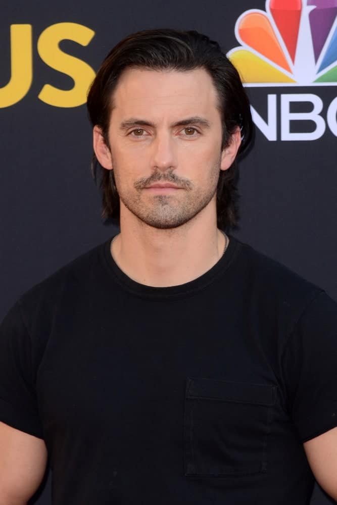 The actor showed up with his usual long side-swept hairstyle at the "This Is Us" Season 2 Premiere Red Carpet at the Neuehouse Hollywood on September 26, 2017.