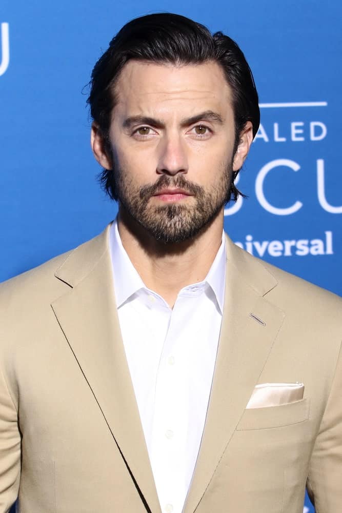 The actor looking gorgeous with a brushed up hairstyle incorporated with a stubble beard. This was taken at the 2017 NBCUniversal Upfront on May 15, 2017, in New York.