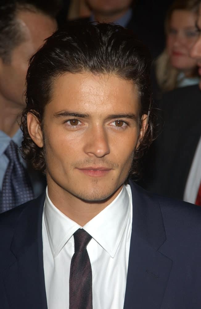 Orlando Bloom's beautiful long curly hair was slicked back for a vintage look at the 2003 premiere of his new movie "The Lord of the Rings: The Return of the King" in Los Angeles.