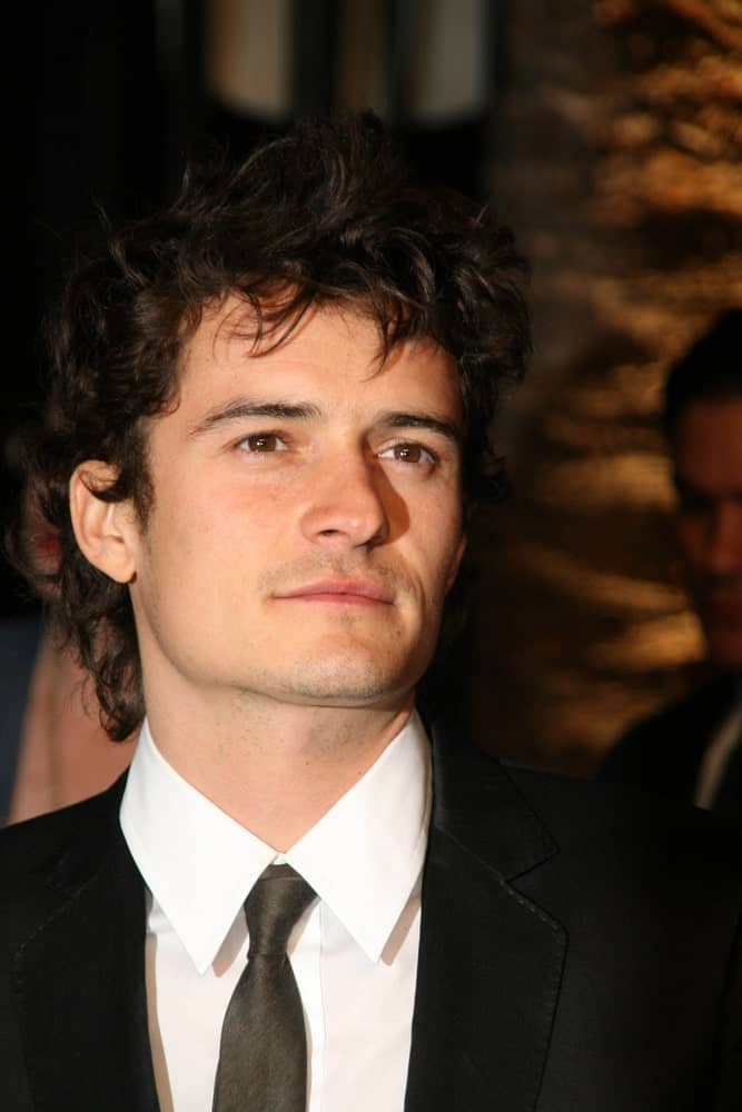 Orlando Bloom's beautiful hazel eyes are on full display with his spiky and curly hairstyle at the 2007 Vanity Fair Oscar Party in Mortons, West Hollywood, CA.
