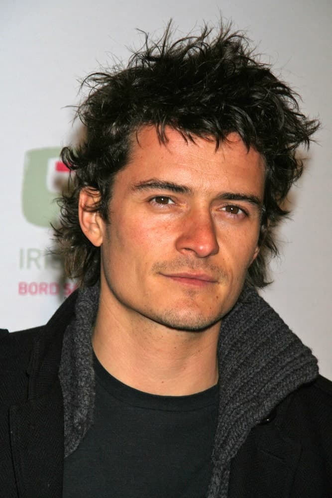 Orlando Bloom went for a messy and spiky hairstyle with his five o'clock shadow and casual outfit at the 2007 US-Ireland Allliance Gala. The Ebell Club of Los Angeles, Los Angeles, CA.