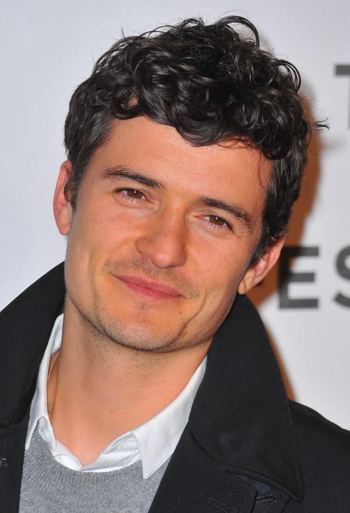 Orlando Bloom's casual winter clothes went quite well with his short curly fade hairstyle and five o'clock shadow at "The Good Doctor" 2011 World Premiere at the 2011 Tribeca Film Festival.