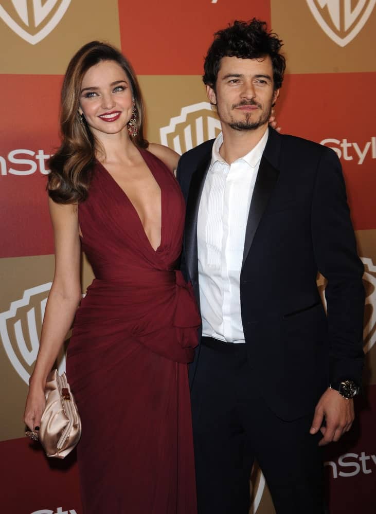 Miranda Kerr & Orlando Bloom attended the WB/In Style Golden Globe Party on January 13, 2013 in Hollywood. Bloom wore a smart casual outfit to go with his messy and curly pompadour hairstyle.