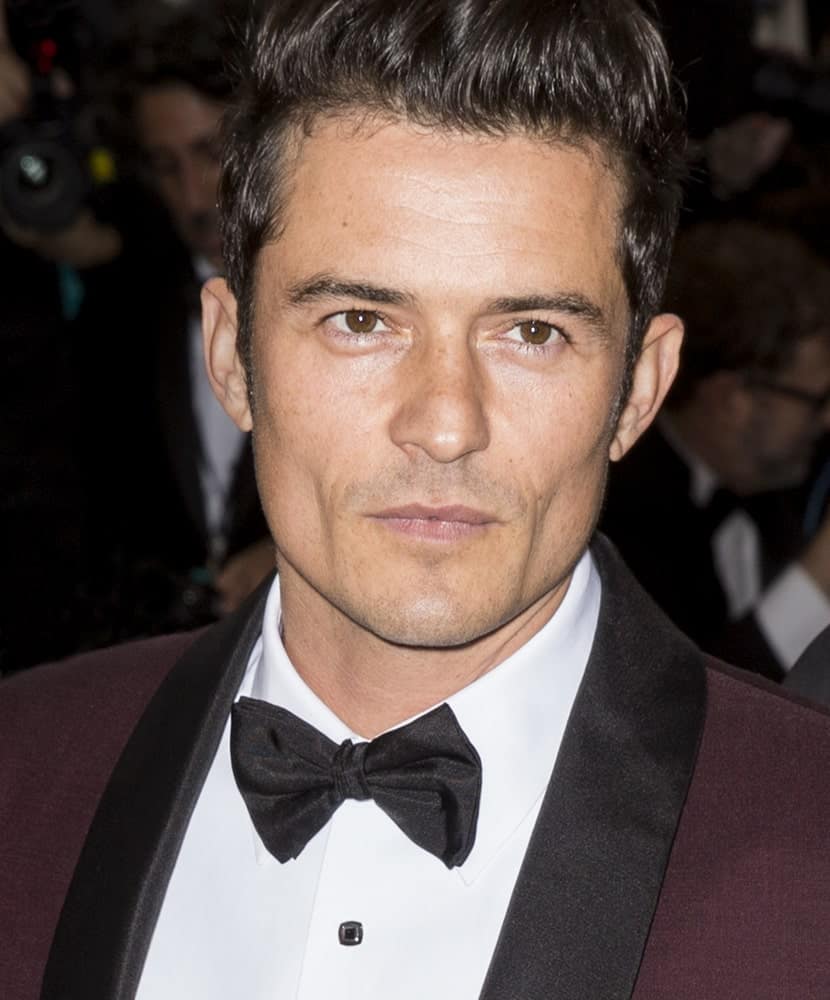 A slightly gaunt Orlando Bloom wearing a pompadour hairstyle attended the 2016 Manus x Machina Fashion in an Age of Technology Costume Institute Gala at the Metropolitan Museum of Art.