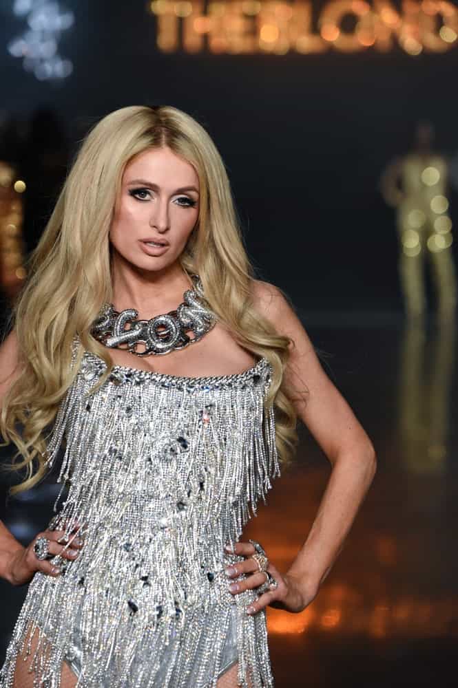 On February 12, 2019, Paris Hilton walked the runway for The Blonds during New York Fashion Week with her long voluminous blonde waves paired with a statement necklace.