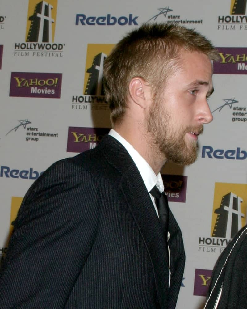 Ryan Gosling wore a dapper suit with his spiky buzz cut hairstyle and full scruffy beard at the Hollywood Film Festival Gala in Beverly Hilton Hotel on October 24, 2005 in Los Angeles, CA.