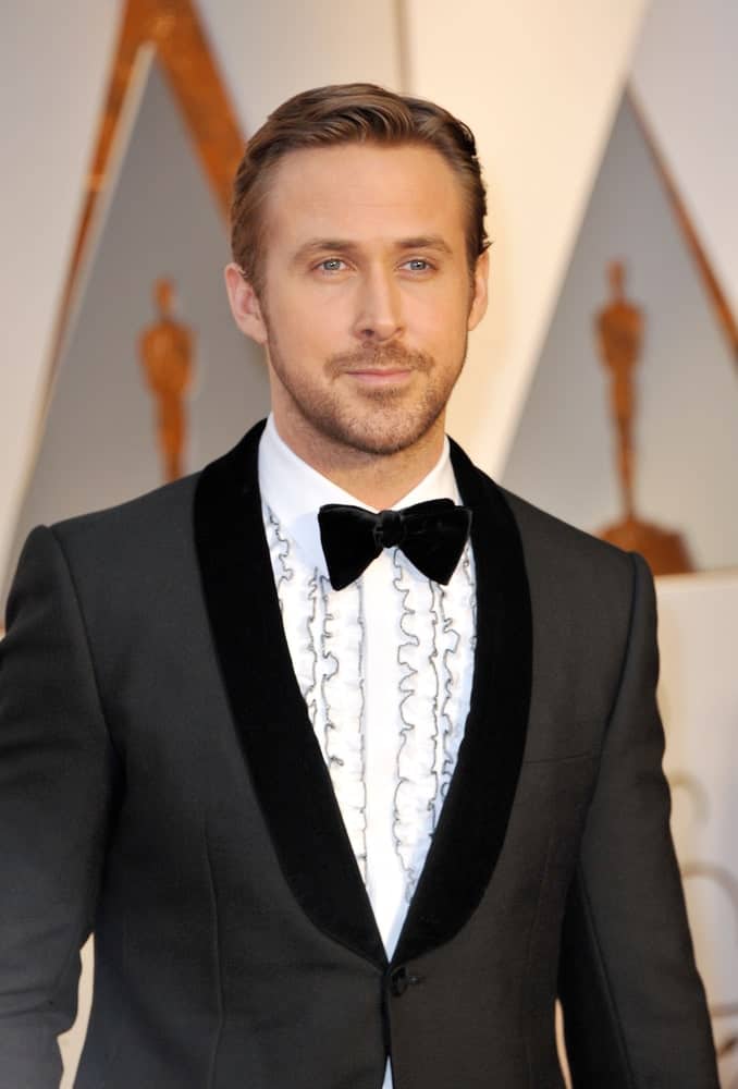 Ryan Gosling was handsome and sophisticated in his classy slicked side-parted hairstyle to go with his tux and tie at the 89th Annual Academy Awards held at the Hollywood and Highland Center in Hollywood on February 26, 2017.